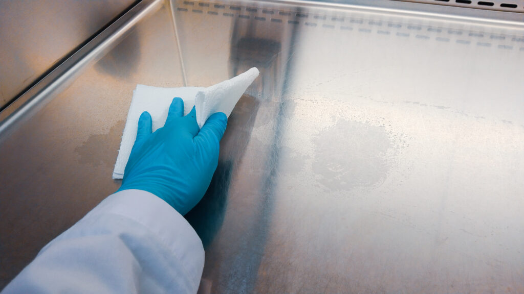 Close-up shot of Cleaning the cabinet surface an antibiotic in the laboratory.